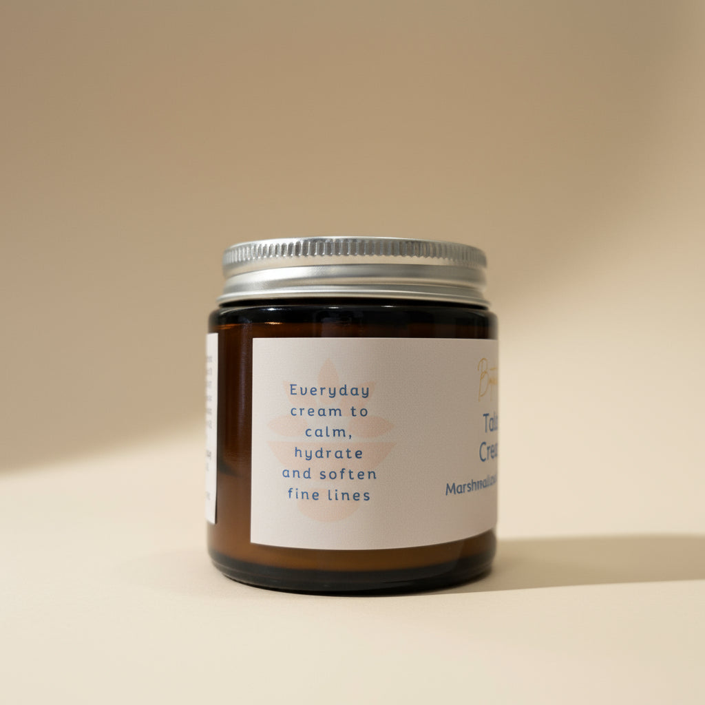 Jar of cream with a label on a beige background