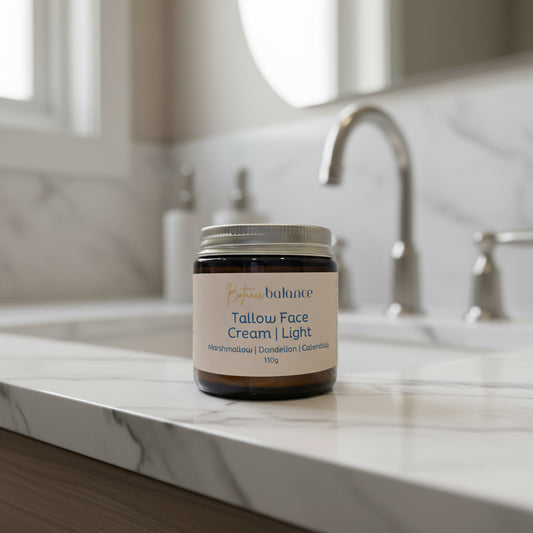 Jar of Tallow Face Cream Light on a countertop